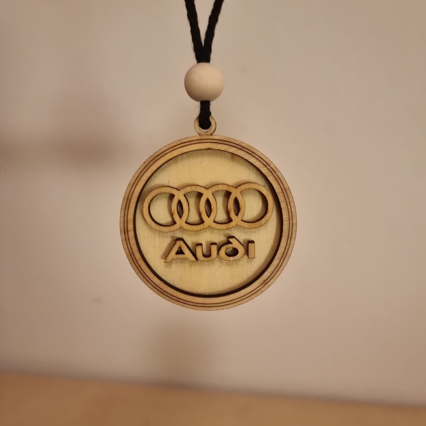 Audi pendant in wood with 3D effect