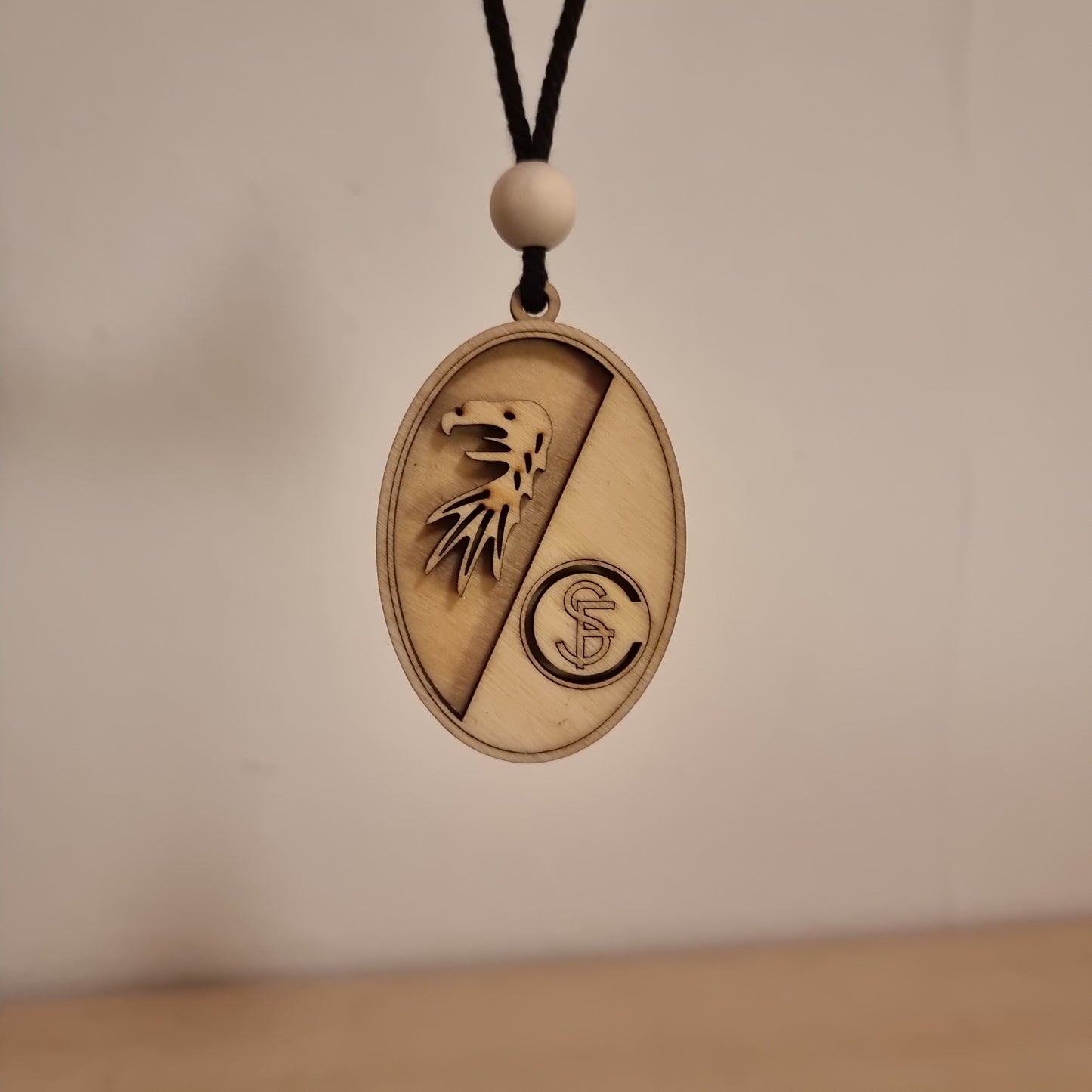 Freiburg FC pendant in wood with 3D effect